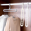 Multi Functional Nine Hole Rotating Magic Clothes Hanger Folding Clothes Drying and Storage Rack